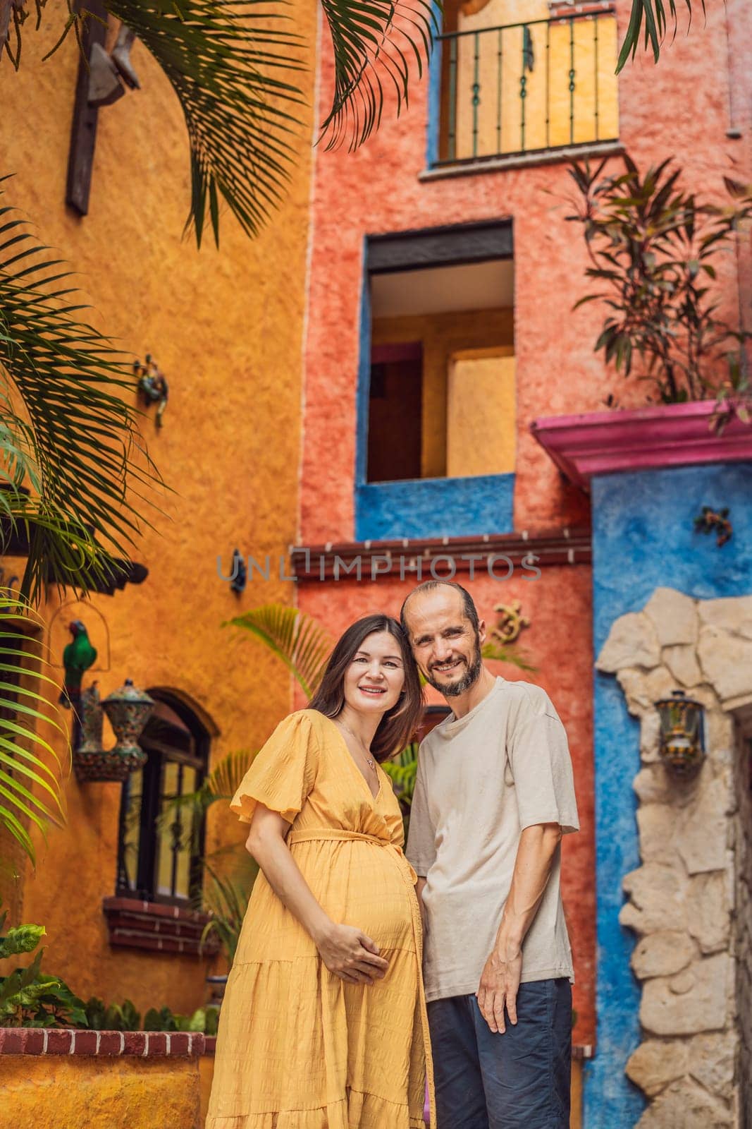 A loving couple in their 40s cherishing the miracle of childbirth in Mexico, embracing the journey of parenthood with joy and anticipation by galitskaya