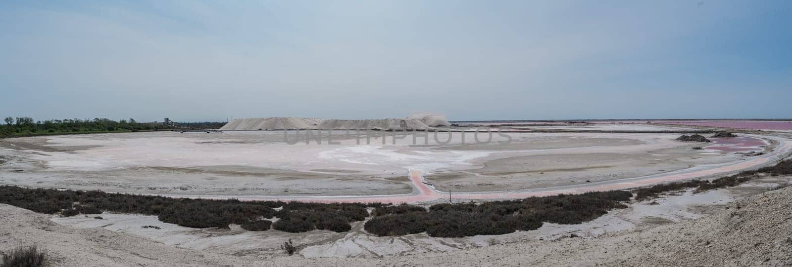 Pink Ponds In Man-made Salt Evaporation Pans In Camargue, Salin de Guiraud, France by FreeProd