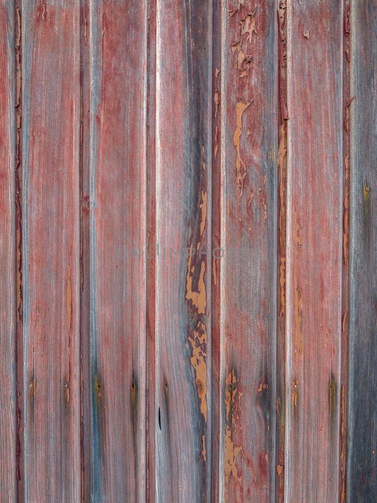 Red painted old wooden wall. Red background.
