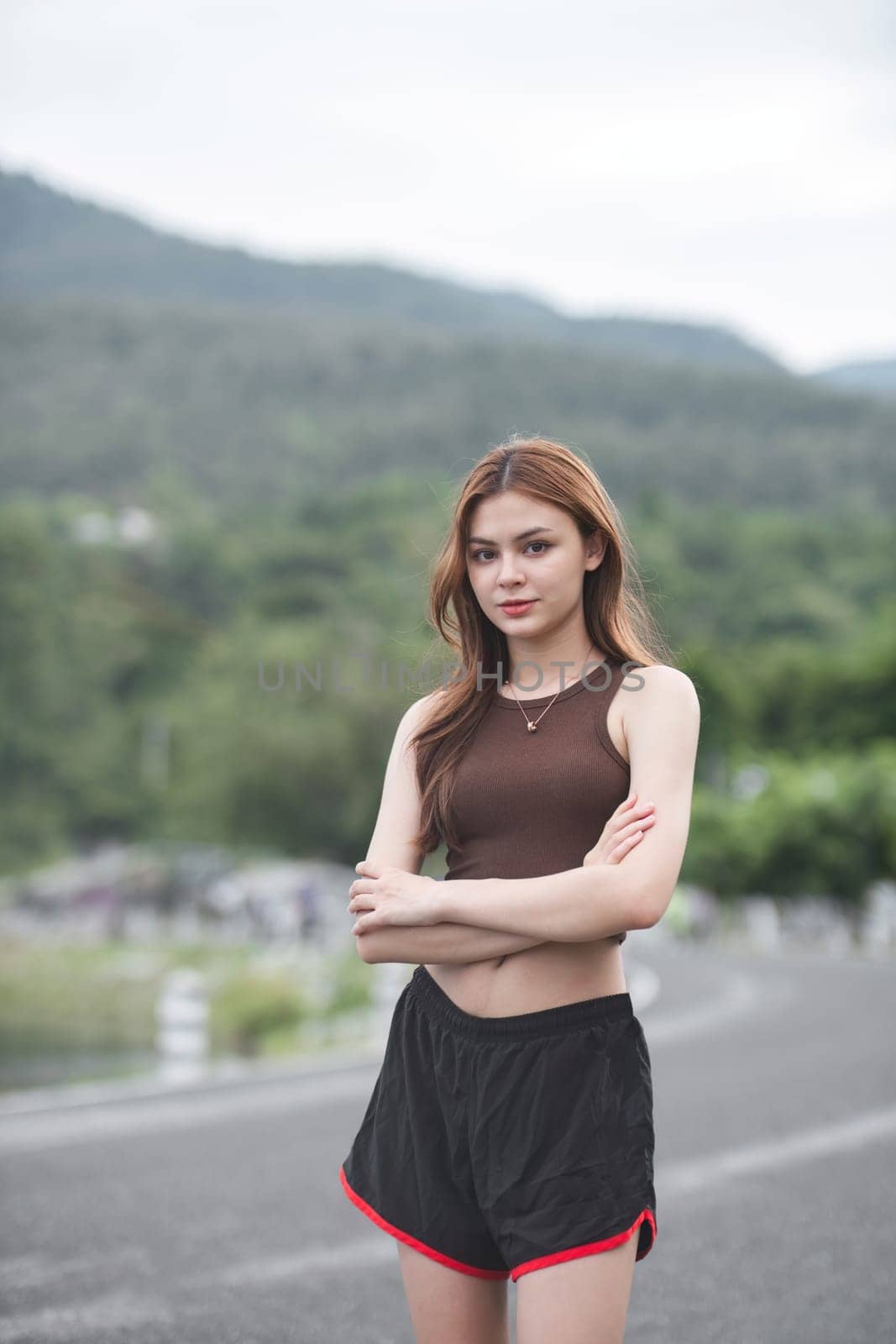 Portrait of a young woman wearing a running suit..