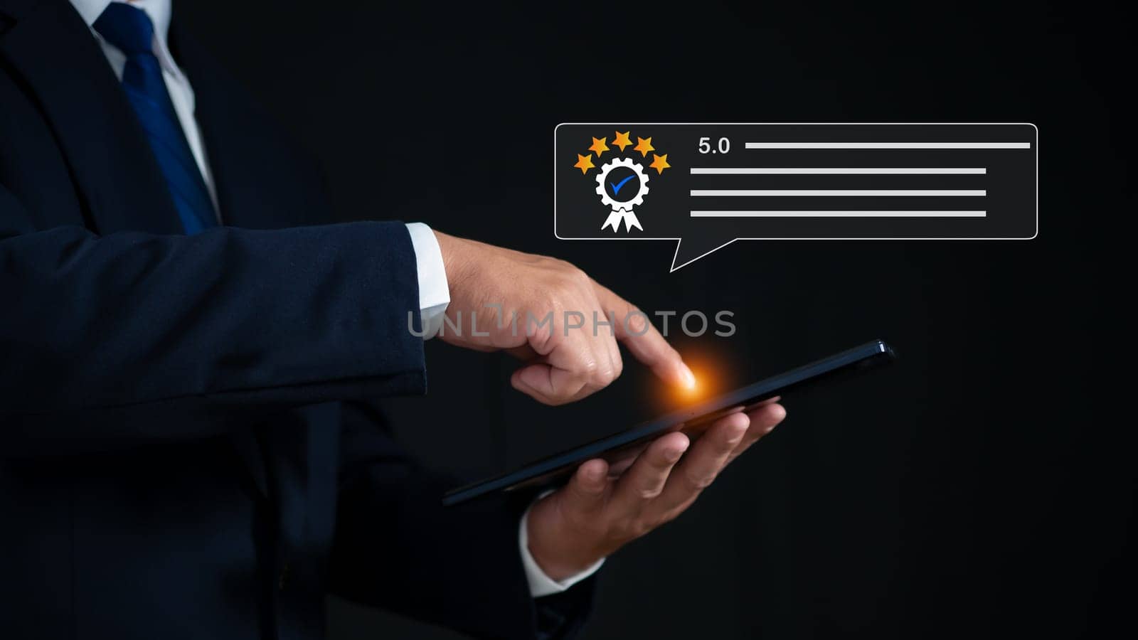 Businessman holding tablet and analyzing customer segments from application. customer satisfaction survey Service experience rating online application by Unimages2527