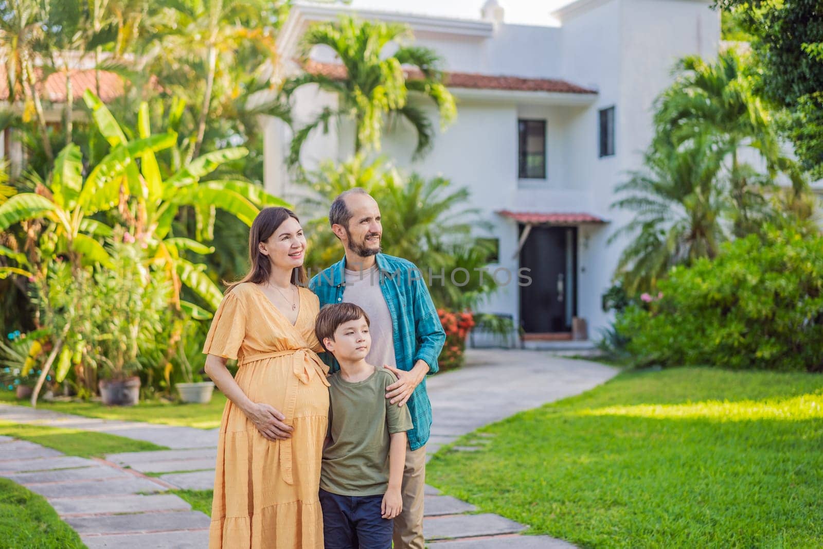 A heartwarming photo depicting a family after 40, with a pregnant mom, dad, and their teenage son, celebrating their new milestone of buying a house together by galitskaya