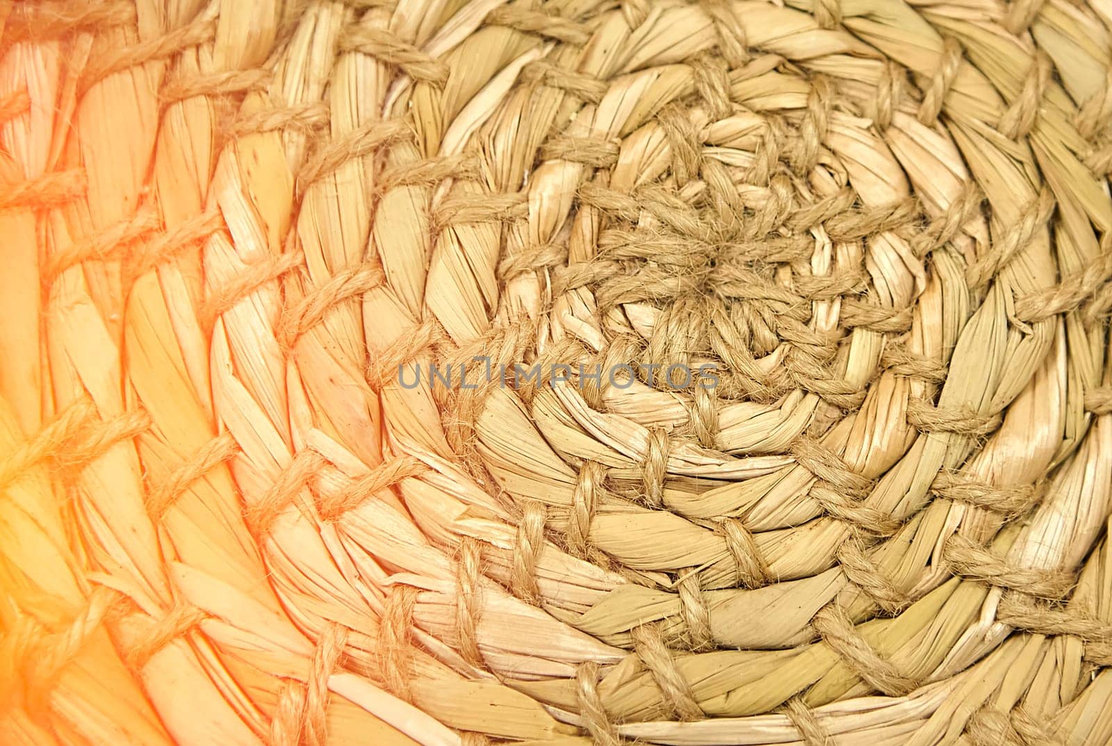 Close-up of Esparto round grass rug, natural fiber background. Weaving from grass and straw, handmade, circle.