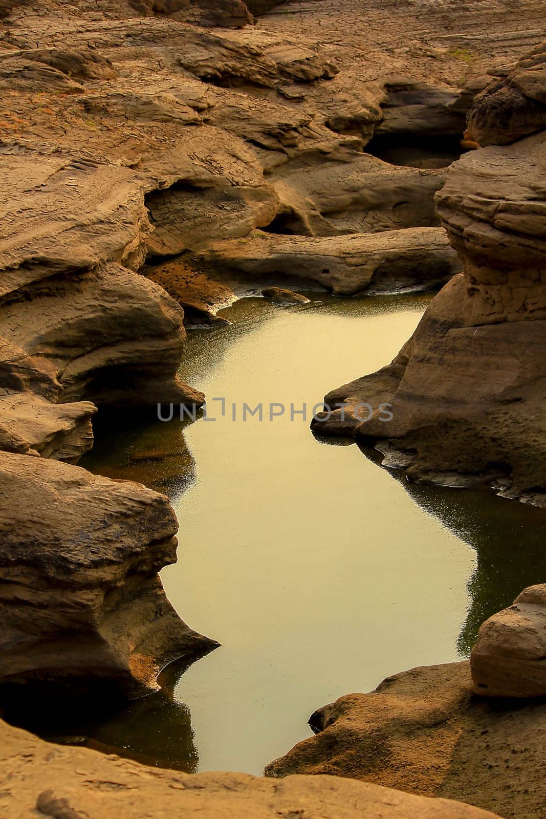 Surface rocks by water erosion.