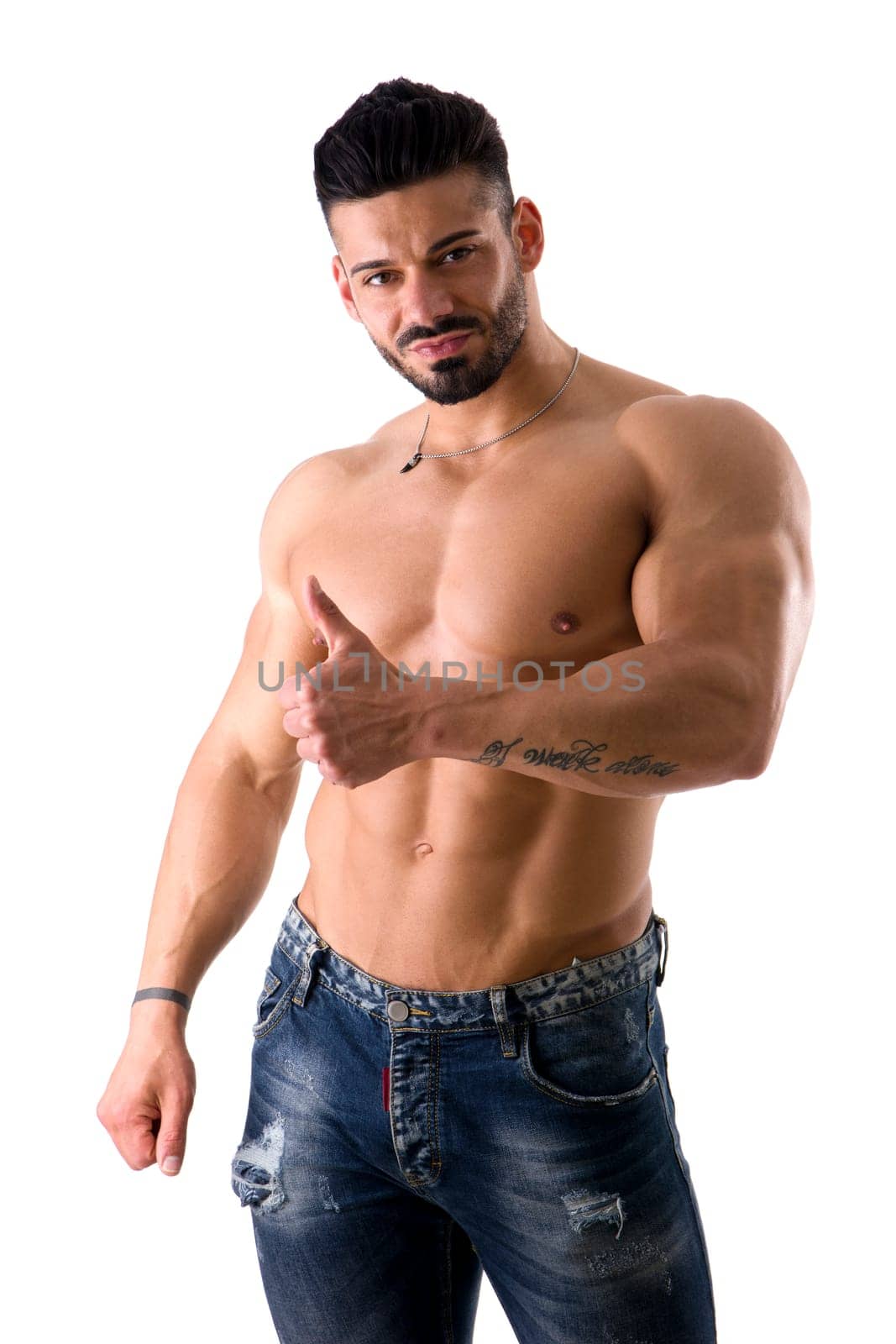 A shirtless man posing for the camera doing thumb up gesture for OK or approval