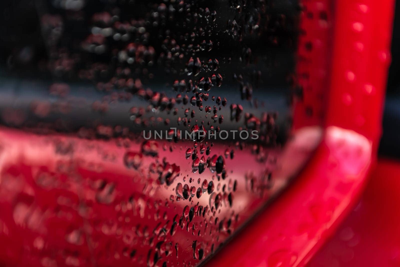 Water drops on the car mirror by orebrik