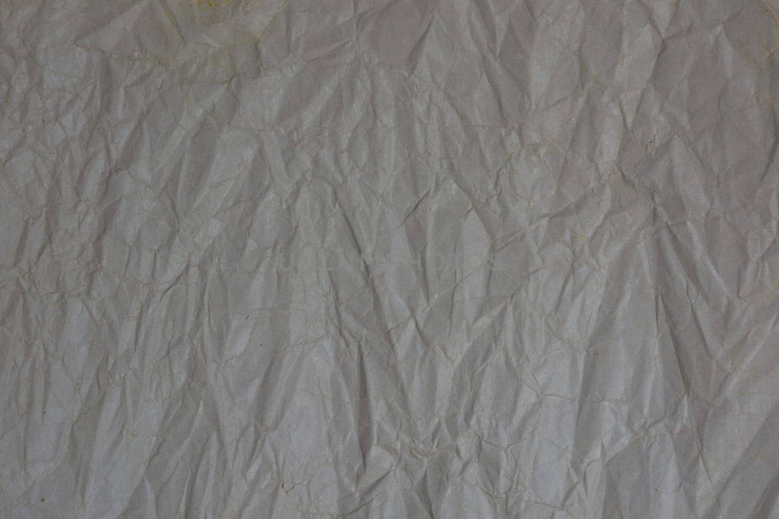 Horizontal dark background from crumpled paper. Recycled paper. Backdrop