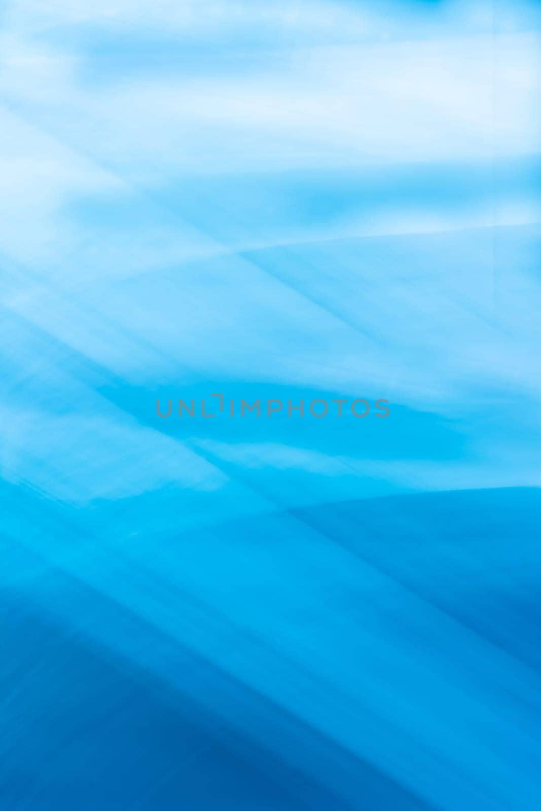 Blue vertical abstract background banner with wave lines crossing and soft gradient. Backdrop