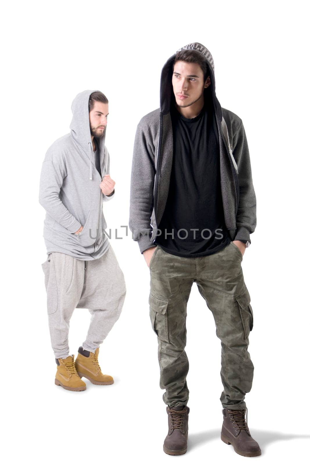 Photo of two men posing together against a blank backdrop by artofphoto