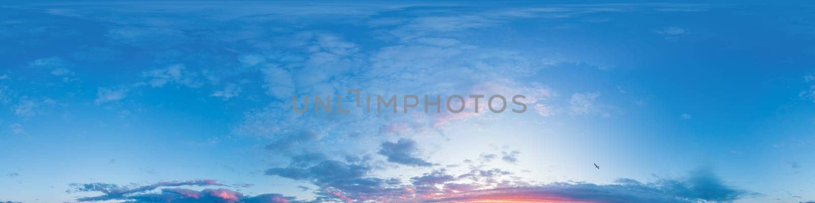 Bright sunset sky panorama with Cirrus clouds. Seamless hdr spherical equirectangular 360 panorama. Sky dome or zenith for 3D visualization, game and sky replacement for aerial drone 360 panoramas.