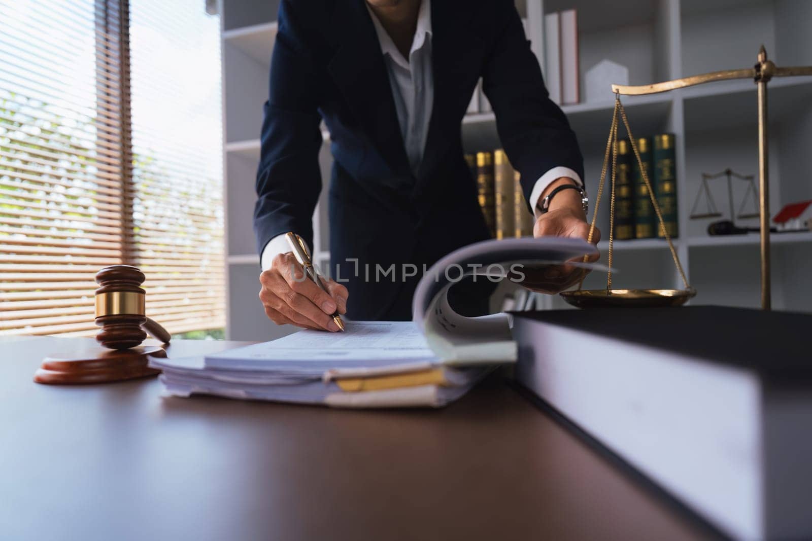 Solicitor pointing at insurance contract showing male client where to write signature sign sale purchase employment agreement at meeting make financial business deal, bank loan service, close up view.