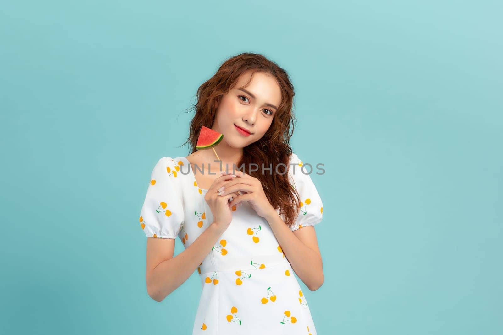 Photo of pretty cheerful girl hold fresh watermelon toothy smile isolated on blue banner background by makidotvn