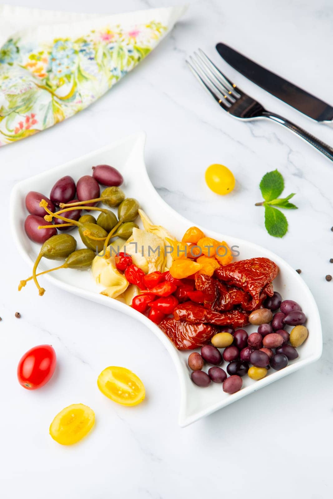 assorted nuts and dried vegetables on a light background