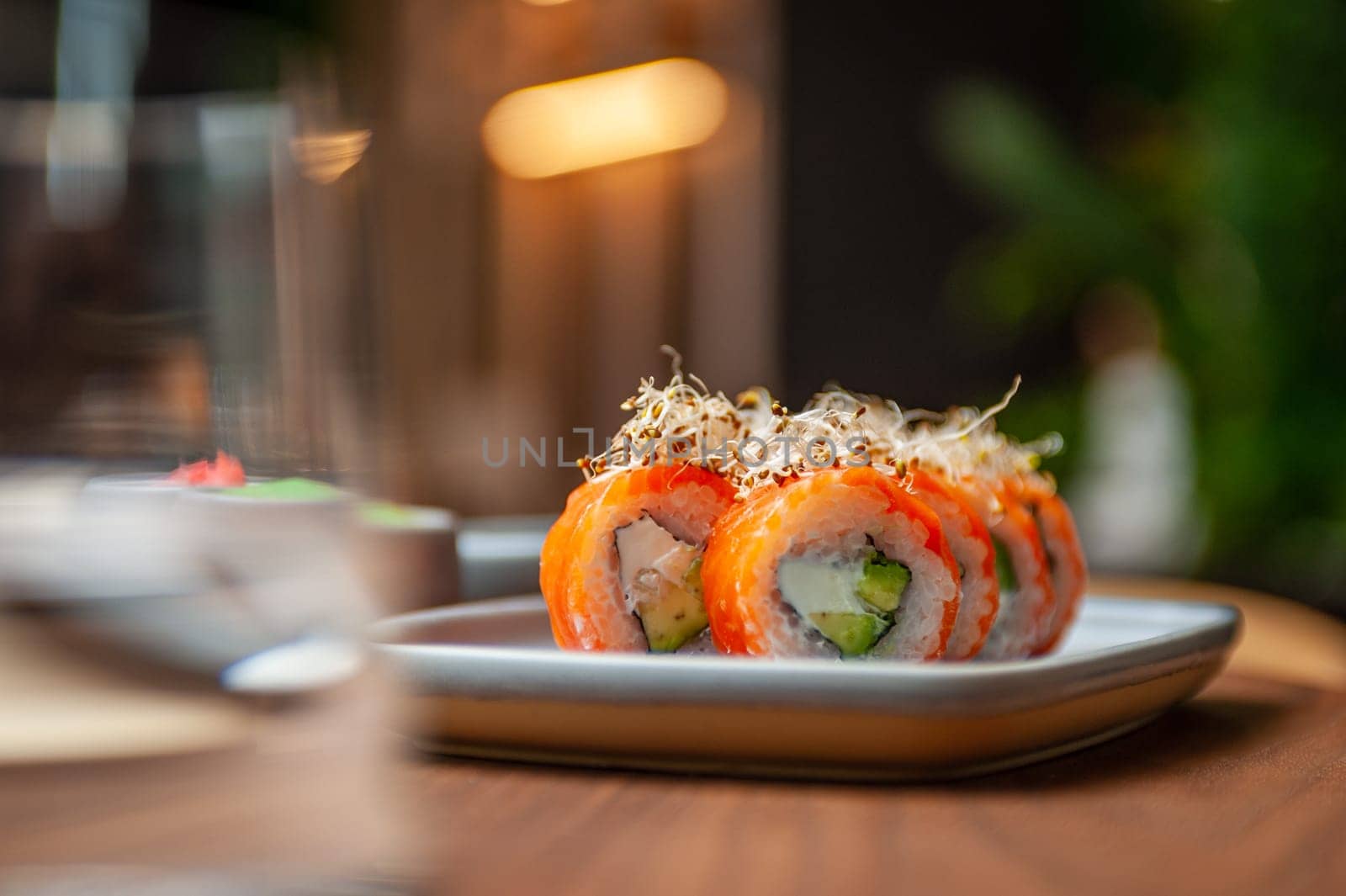 Classic Philadelphia sushi roll set with salmon and cream cheese. Japanese dish of fresh salmon and rice. High quality photo