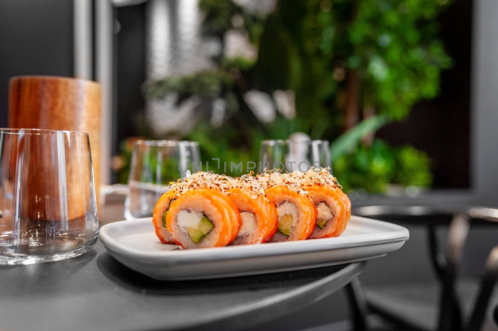 Classic Philadelphia sushi roll set with salmon and cream cheese. Japanese dish of fresh salmon and rice. High quality photo