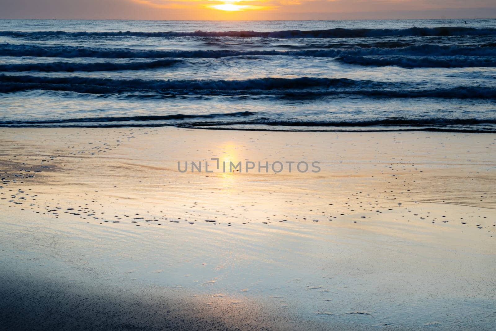 Affirmation photo You are free to be different Love yourself sunset over the sea horizon orange sky clouds dark sea water edge sand.