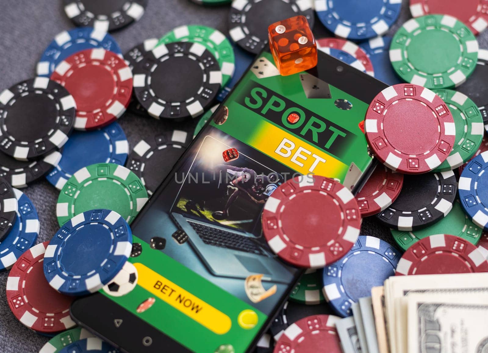 Online poker concept. Smartphone and poker chips on a green background. Poker online banner. Copy space. Vignette. Place for text. Gambling. Background. by Andelov13