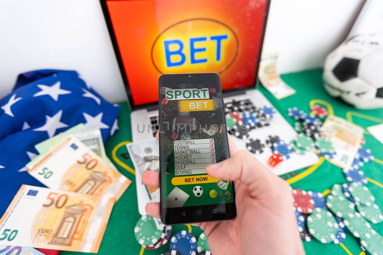 Live in-play betting app on smartphone display, a woman is betting at home and winning, POV shot. High quality photo