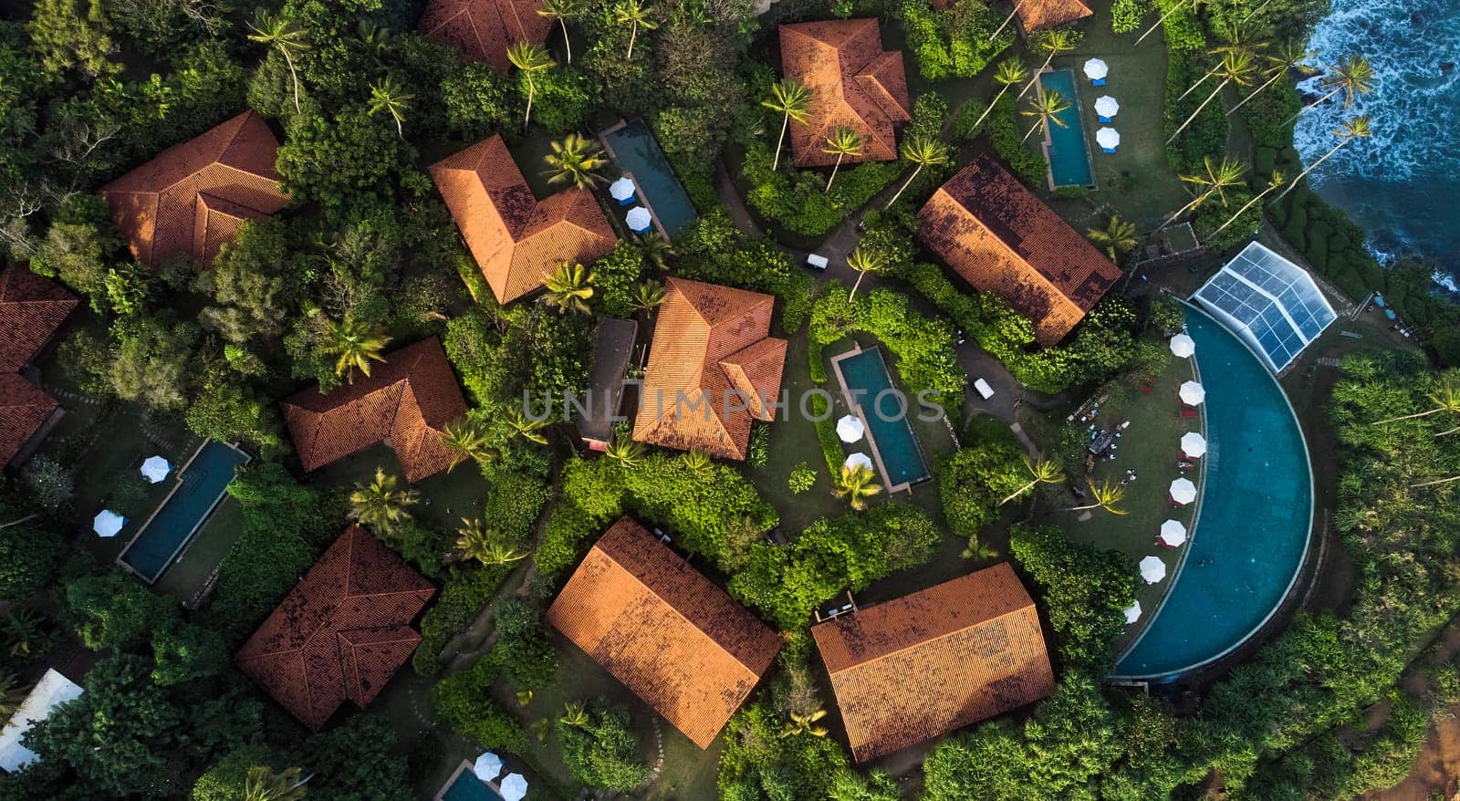 Aerial view of a premium hotel complex with swimming pools in Sri Lanka. High quality photo