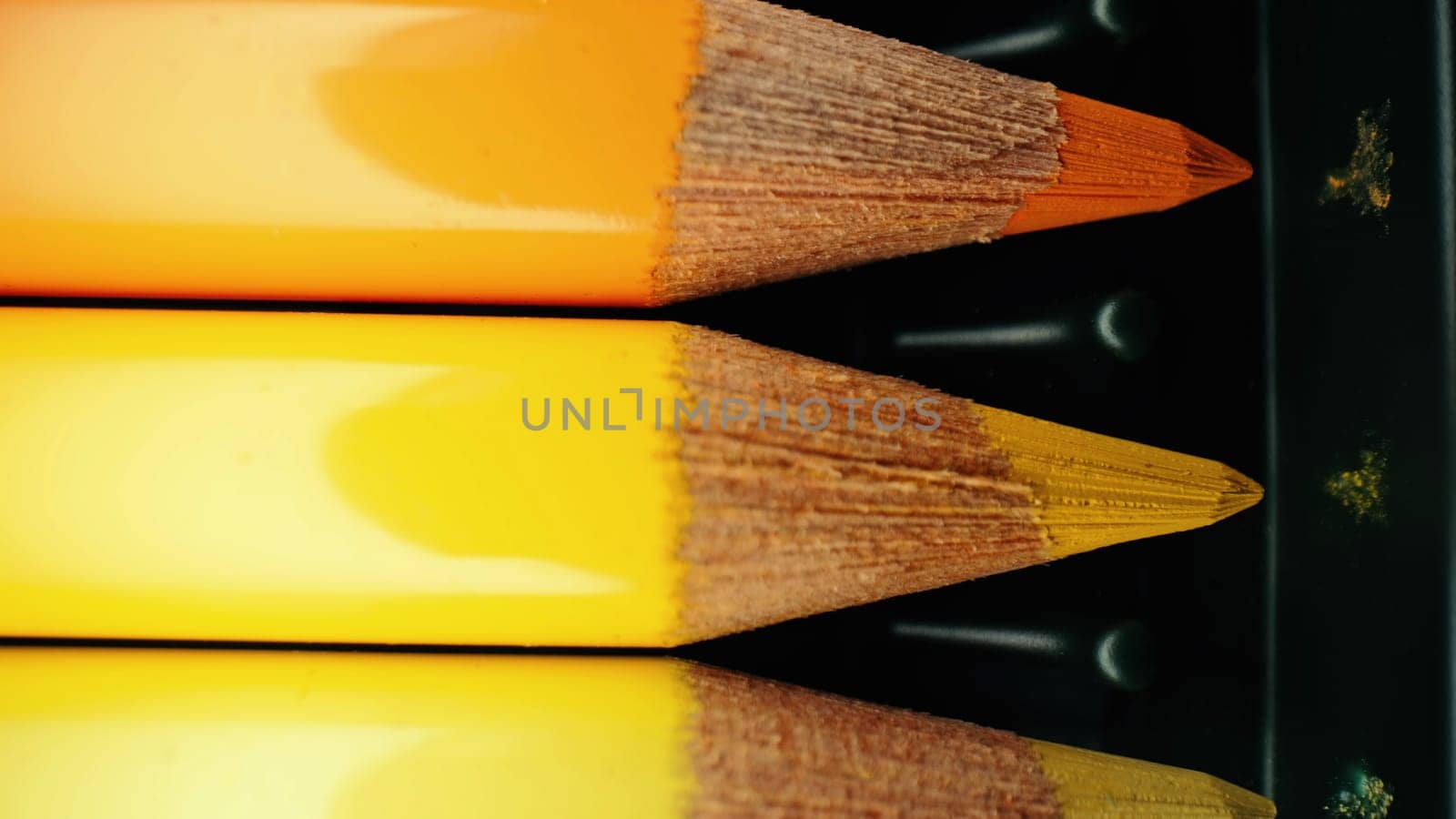 Crayons in yellow gradient row. Extreme macro shot. Pencils graphite set. by kristina_kokhanova