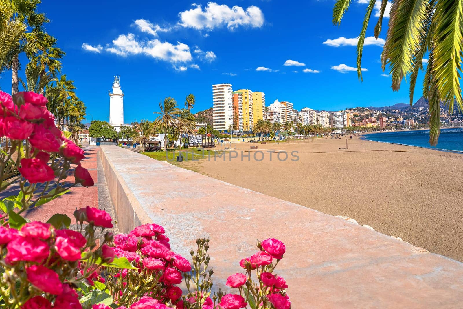 Malaga beach and lighthouse panoramic view by xbrchx