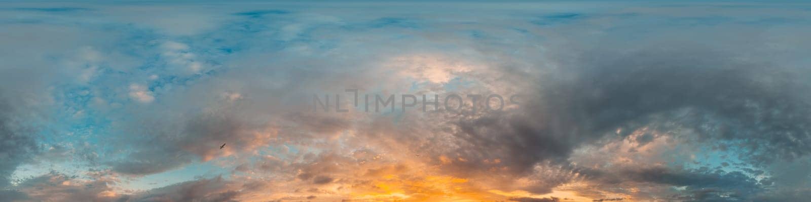 Bright sunset sky panorama with Cirrus clouds. Seamless hdr spherical equirectangular 360 panorama. Sky dome or zenith for 3D visualization, game and sky replacement for aerial drone 360 panoramas.