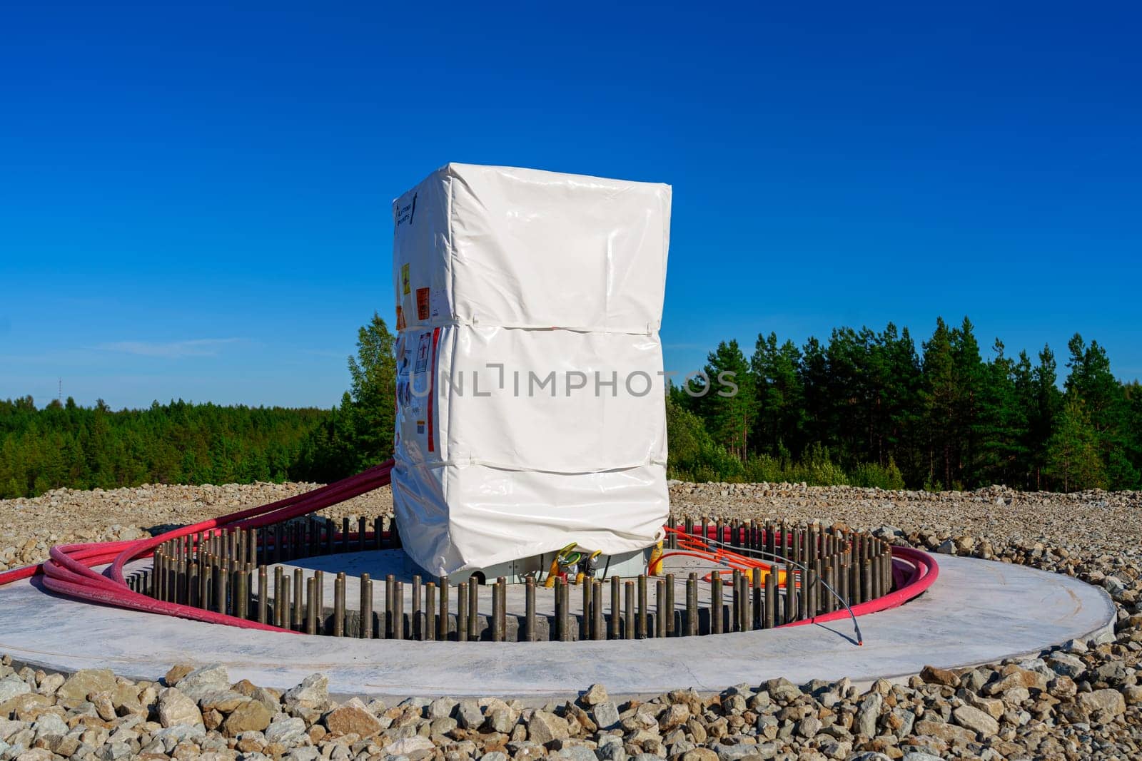 Installing First Heavy Components on Concrete Foundation for Future Wind Turbine by PhotoTime