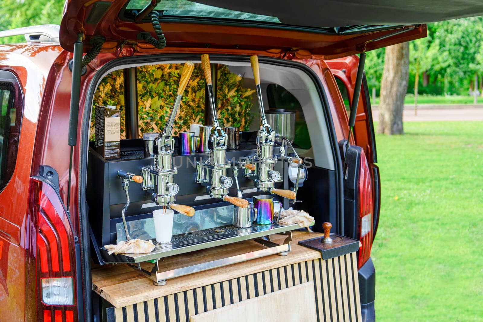 Professional Coffee Machine Installed in the Back of a Car: Coffee Service for Outdoor Events and Open Air