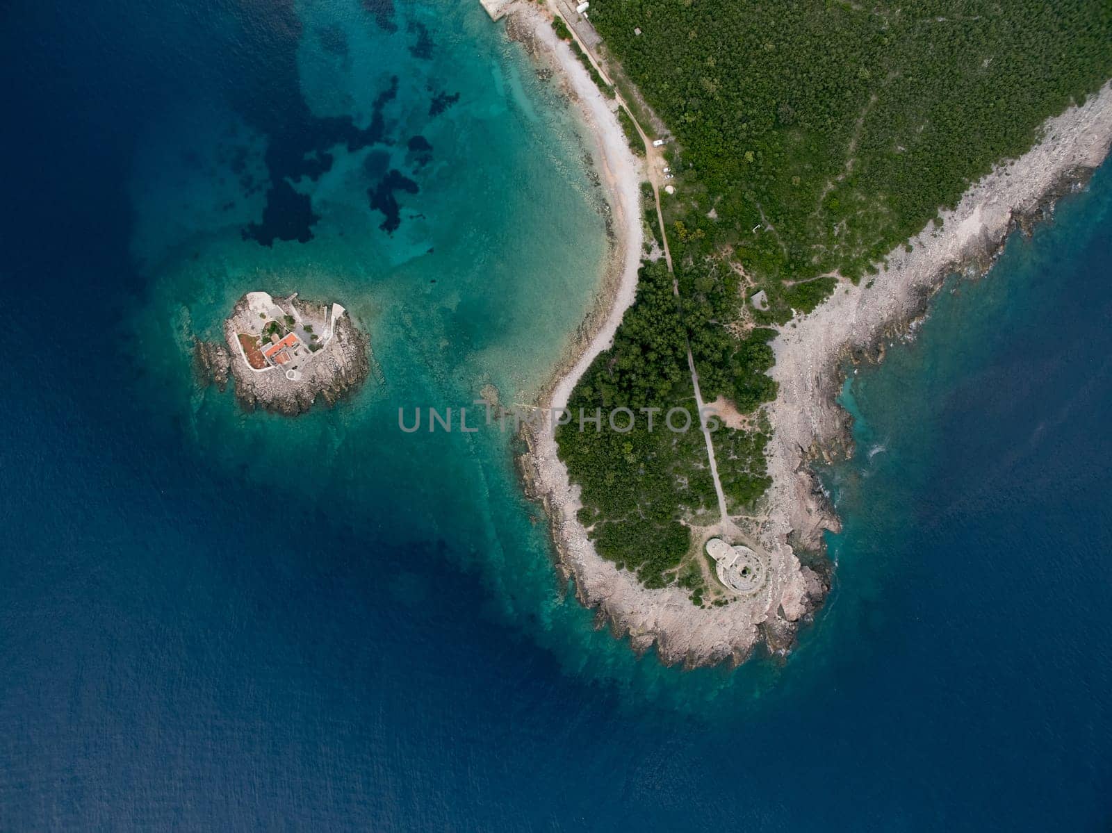 Otocic Gospa Island near the Mamula Peninsula. Montenegro. Drone by Nadtochiy