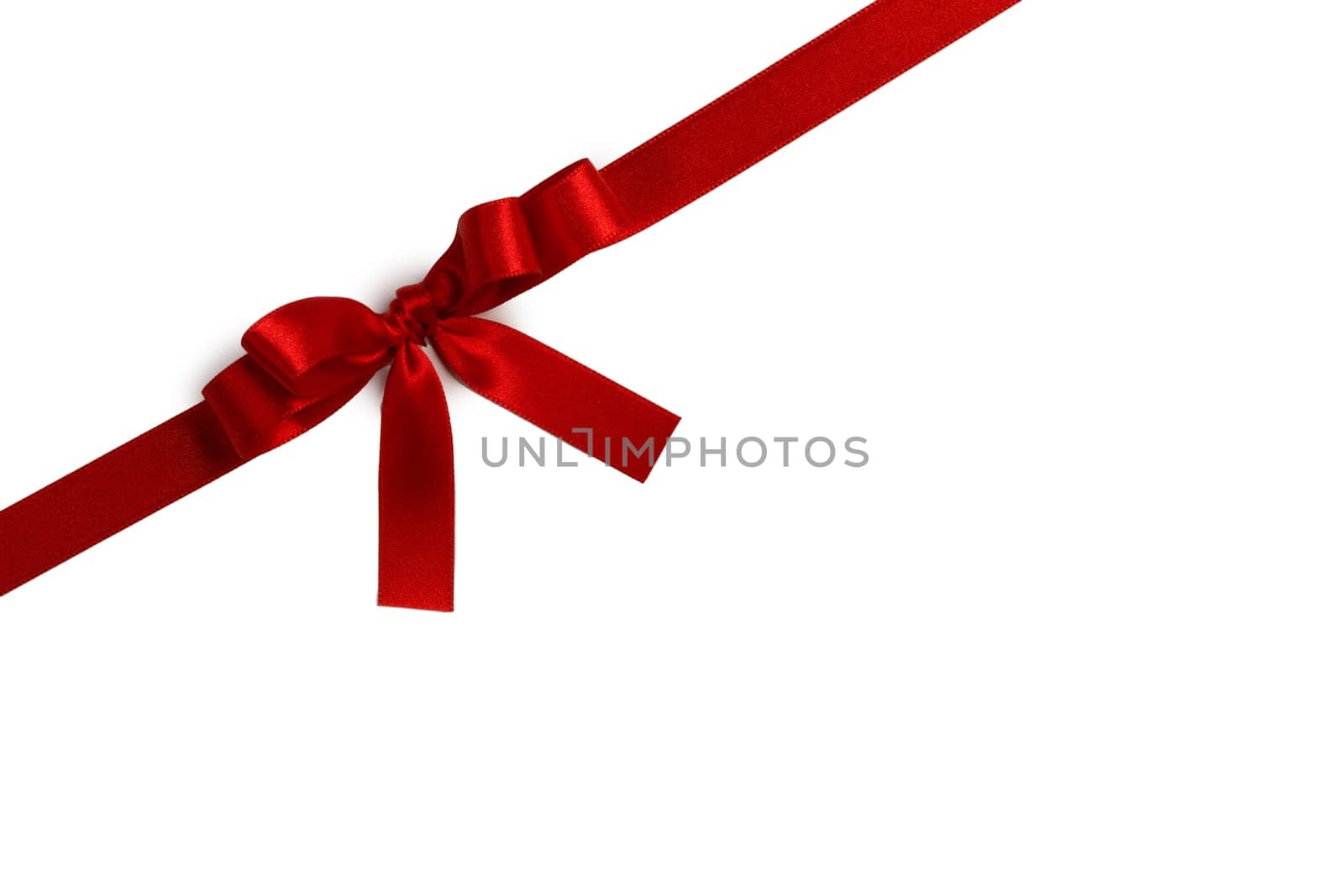 Red bow isolated on white by Yellowj