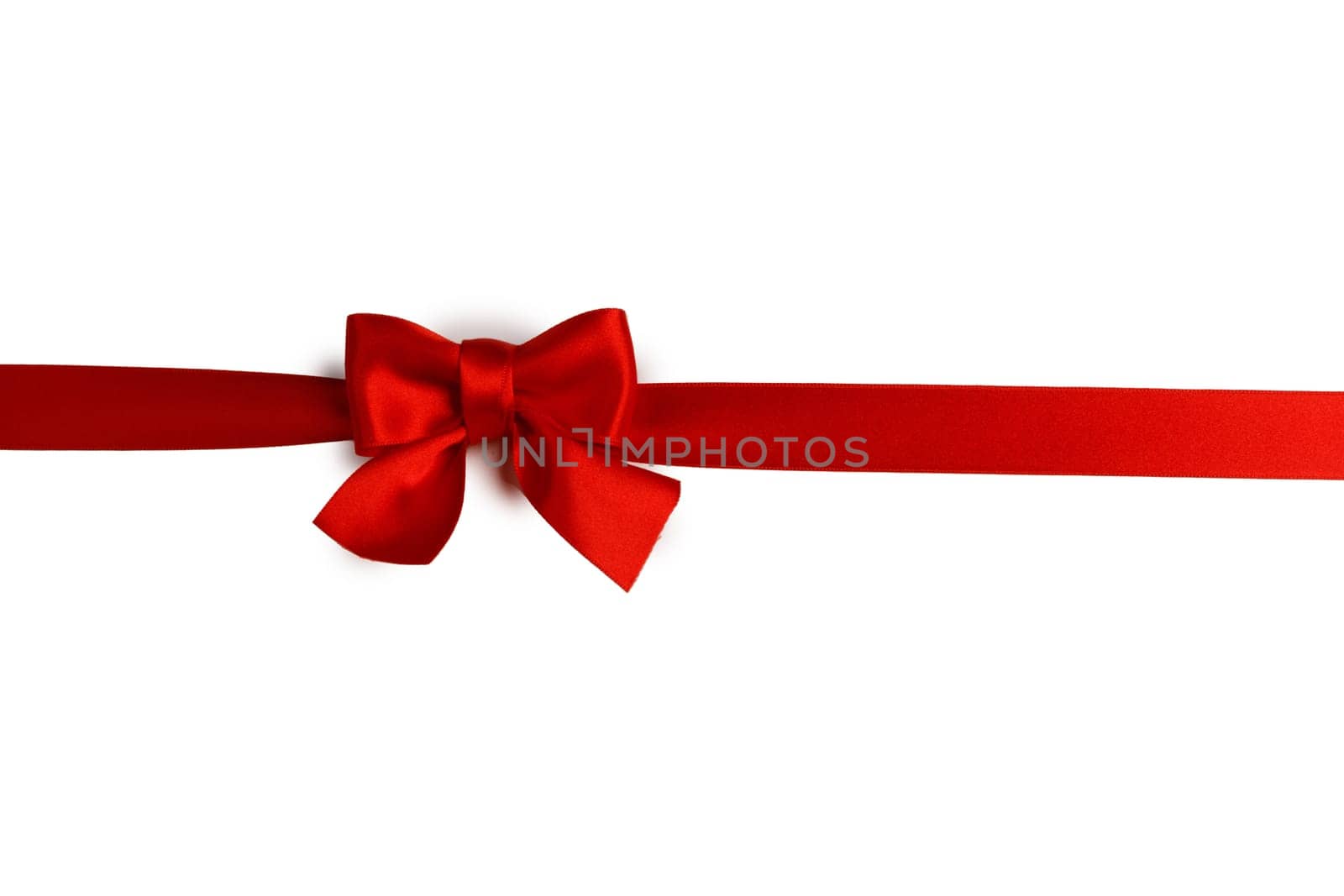 Red gift bow on white by Yellowj