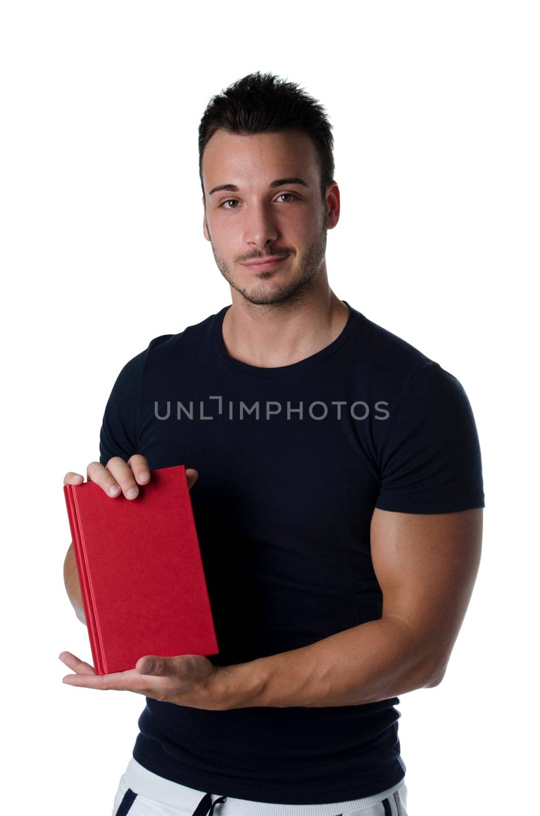 Maroon T-Shirt Man Holding Book - Portrait on White Background.A young adult in casual clothing shows a book on white background.