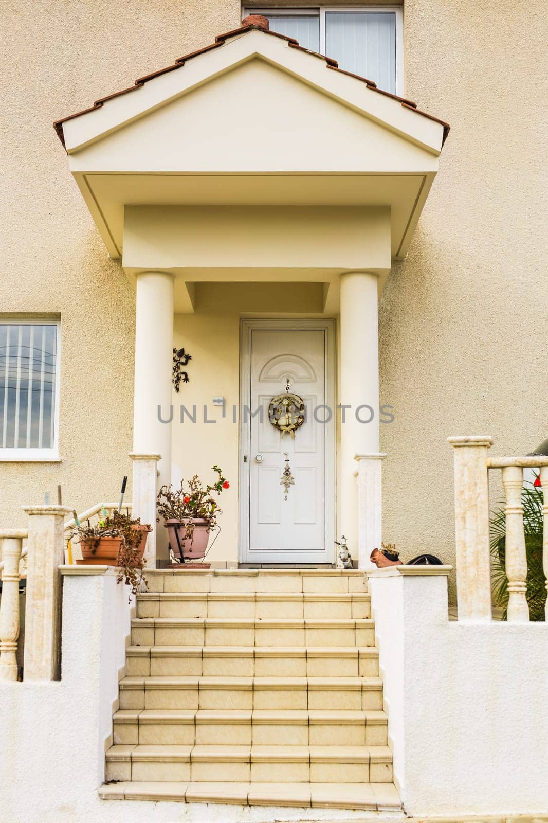 Door with natural wreath decoration for Christmas holiday