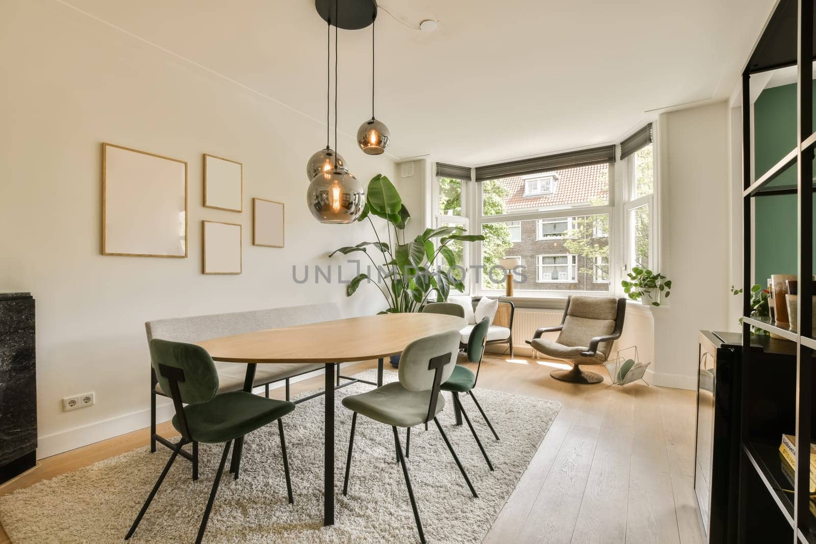 a living room with a dining room table and chairs by casamedia