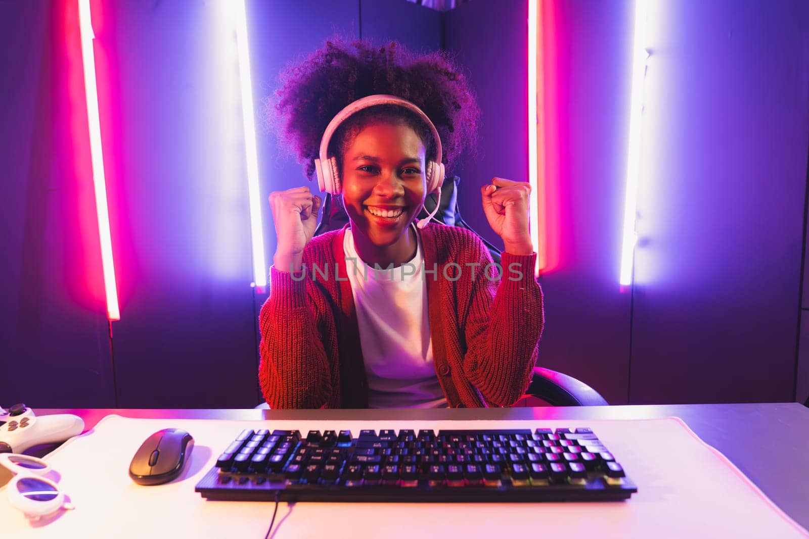 Gaming streamer, African girl playing online fighting with Esport. Tastemaker. by biancoblue