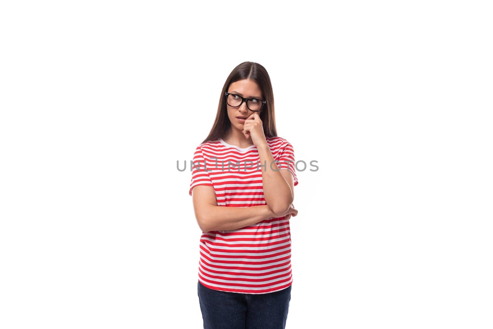 pretty 35 year old european lady in a red striped t-shirt wears glasses for vision correction on a white background with copy space.