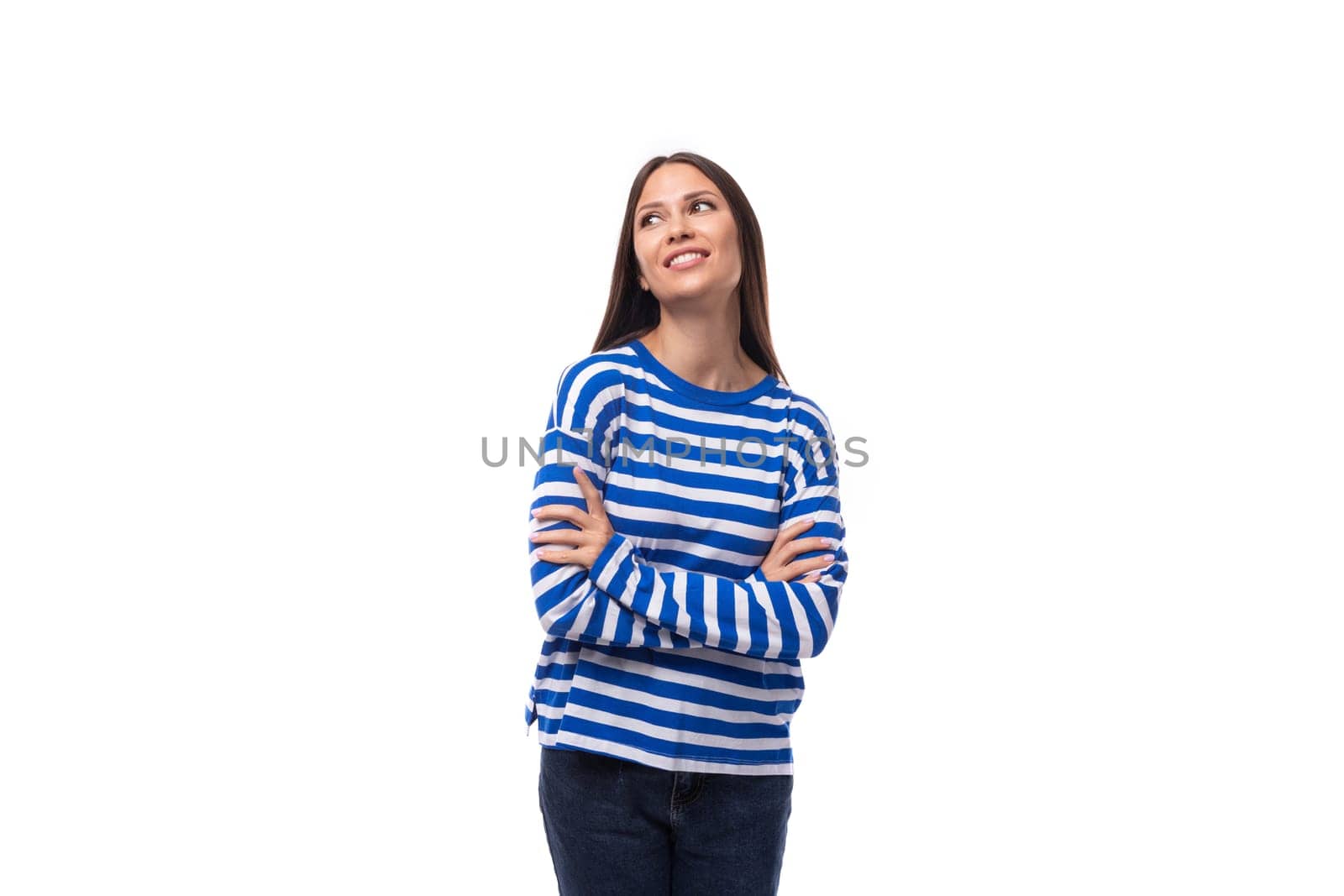 charming young slim european model woman wears striped blouse on white background with copy space.