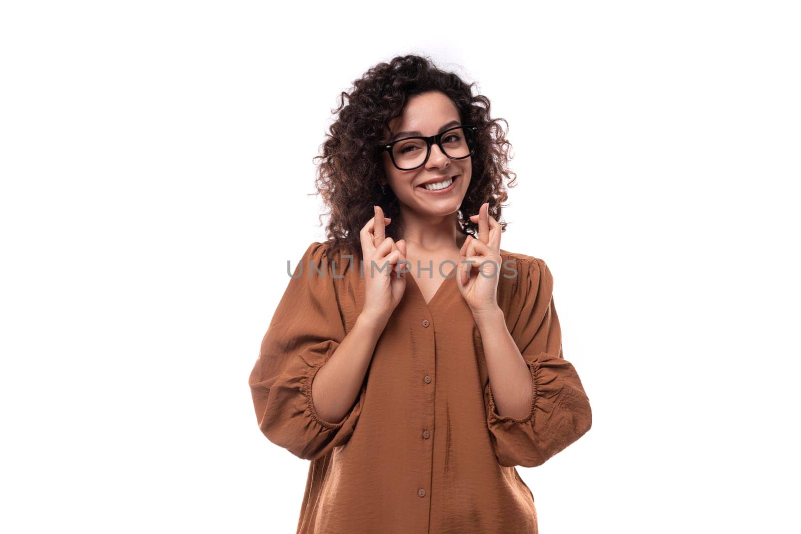 young cute caucasian curly brunette woman dressed in a beautiful brown shirt by TRMK