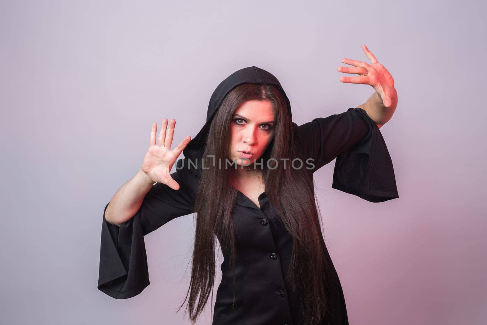 Gothic young woman in witch halloween costume by Satura86