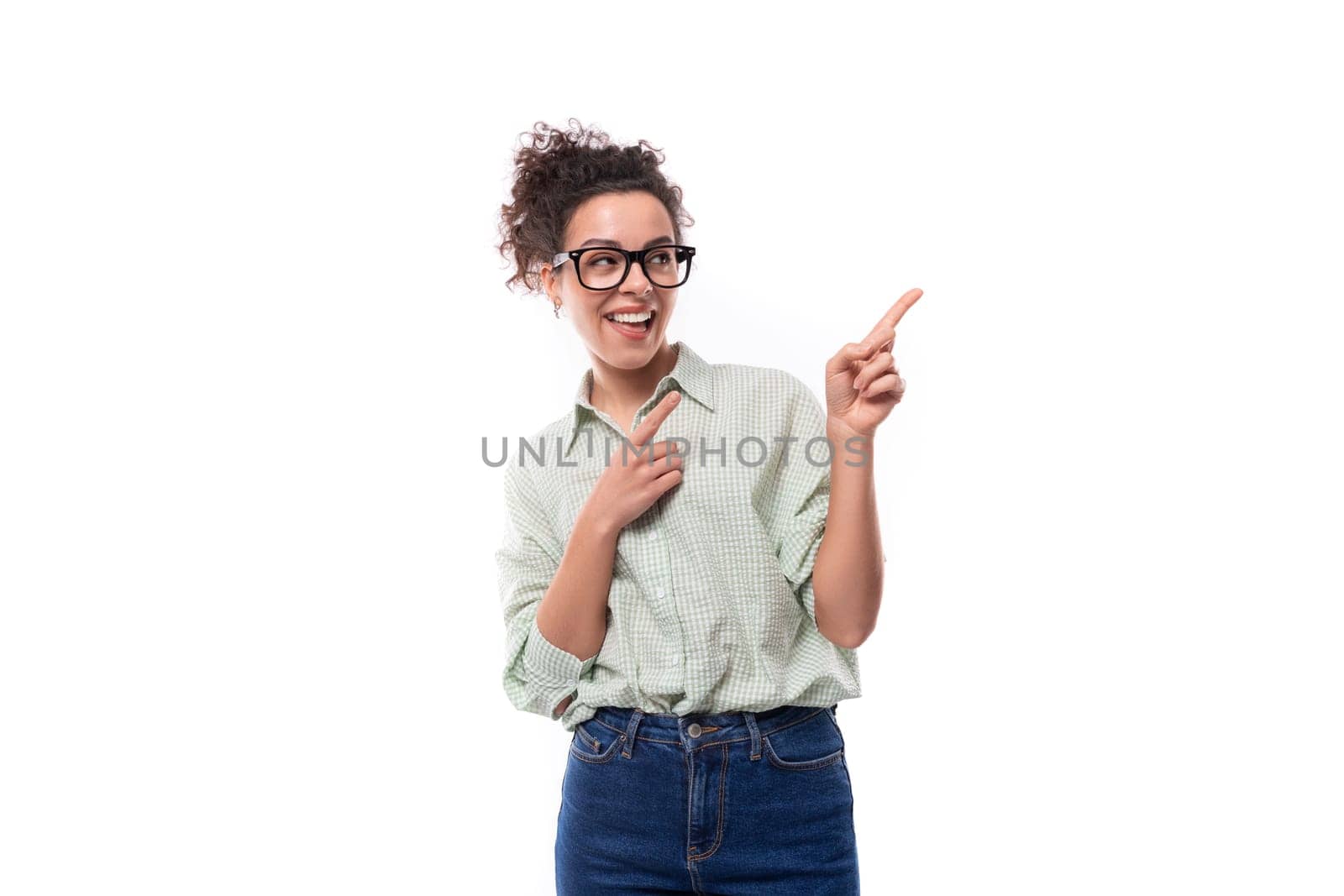 young confident leader woman with curly black hair wears glasses.