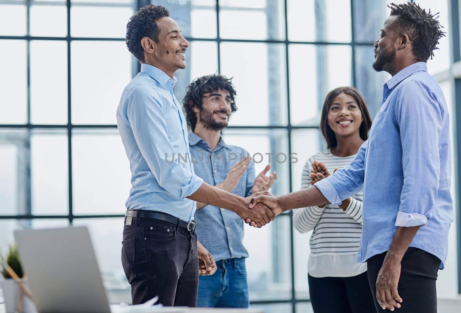 Corporate Professional Embracing Collaboration. Handshake