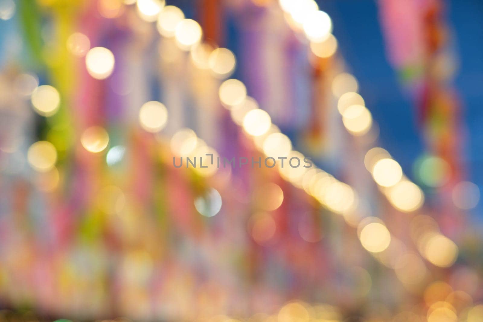 Abstract background with bokeh of lantern lights at night. Popular lantern festival during Loy Krathong in northern Thailand. by TEERASAK