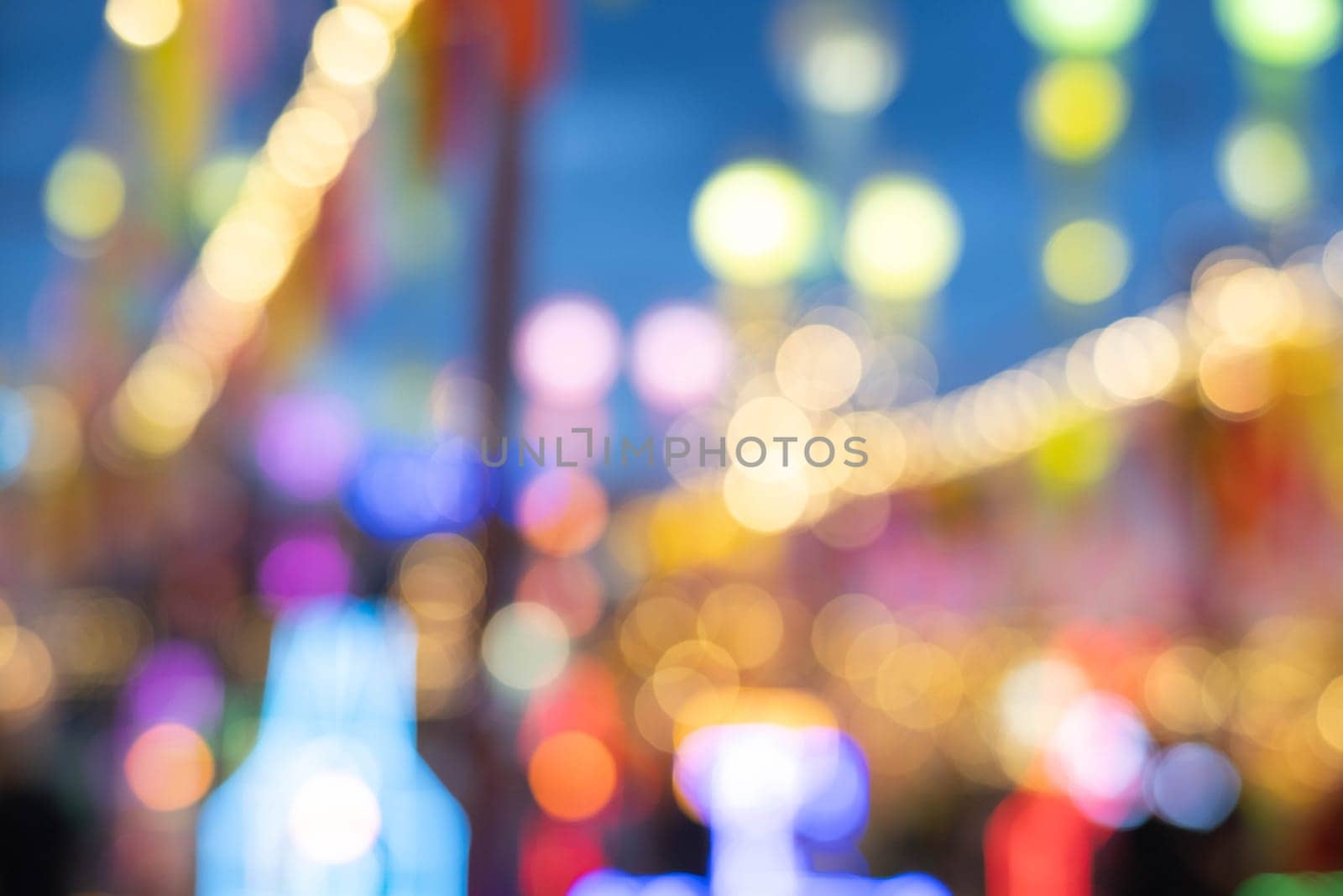 Abstract background with bokeh of lantern lights at night. Popular lantern festival during Loy Krathong in northern Thailand. by TEERASAK