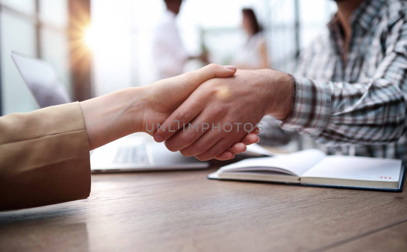 businessman shaking hands businessman in the office. success concept