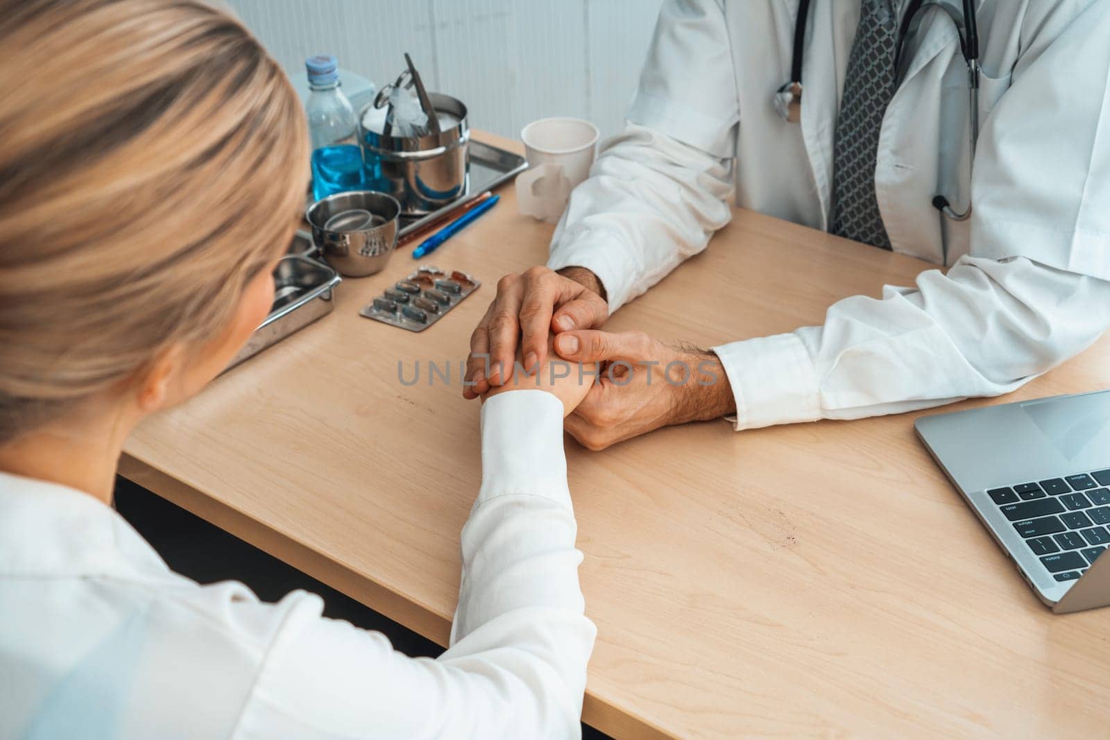 Doctor in professional uniform examining patient at hospital or medical clinic. Health care , medical and doctor staff service concept. Jivy