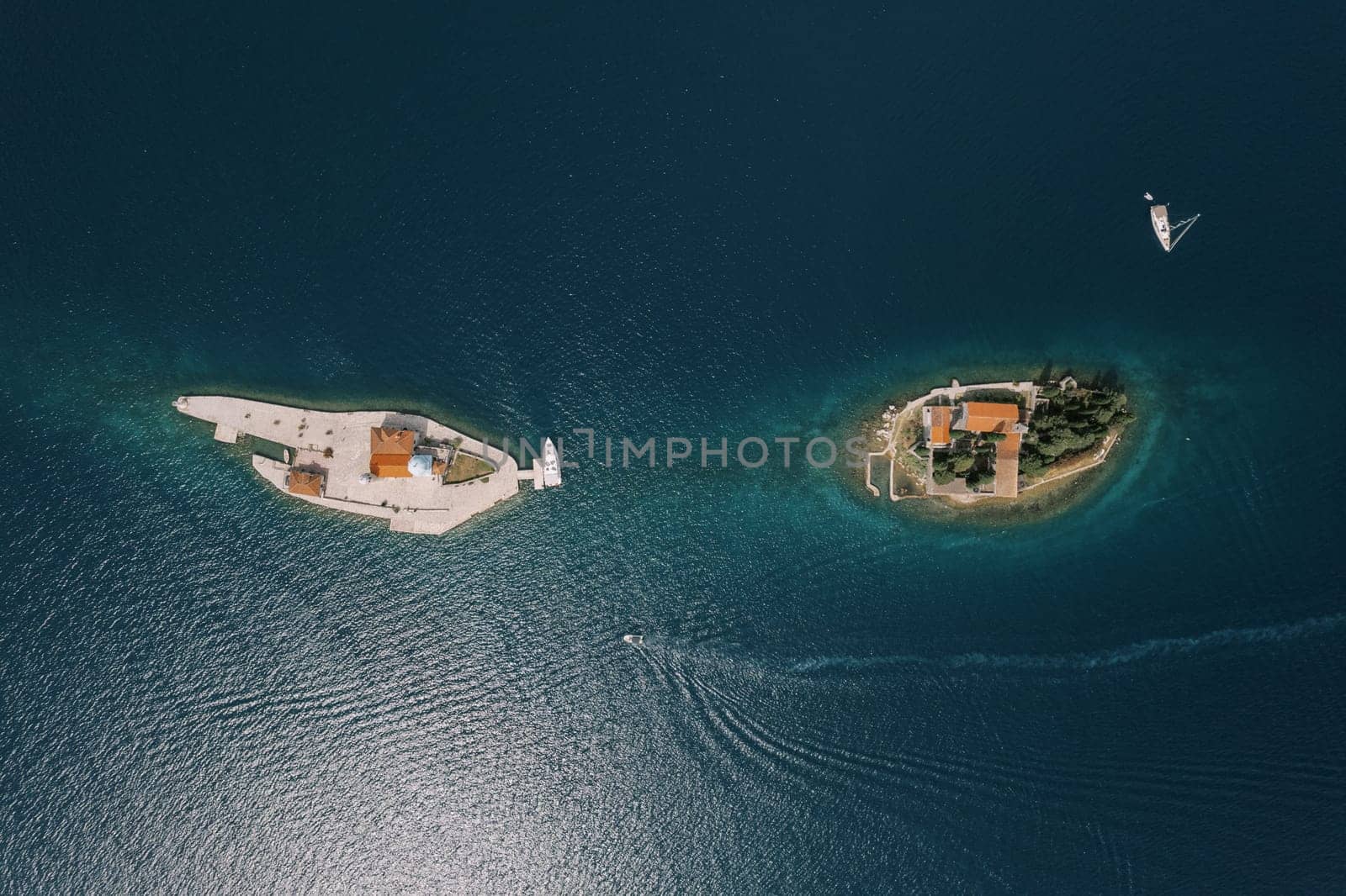 Island of Gospa od Skrpjela near the island of St. George in the sea. Montenegro. Top view. High quality photo