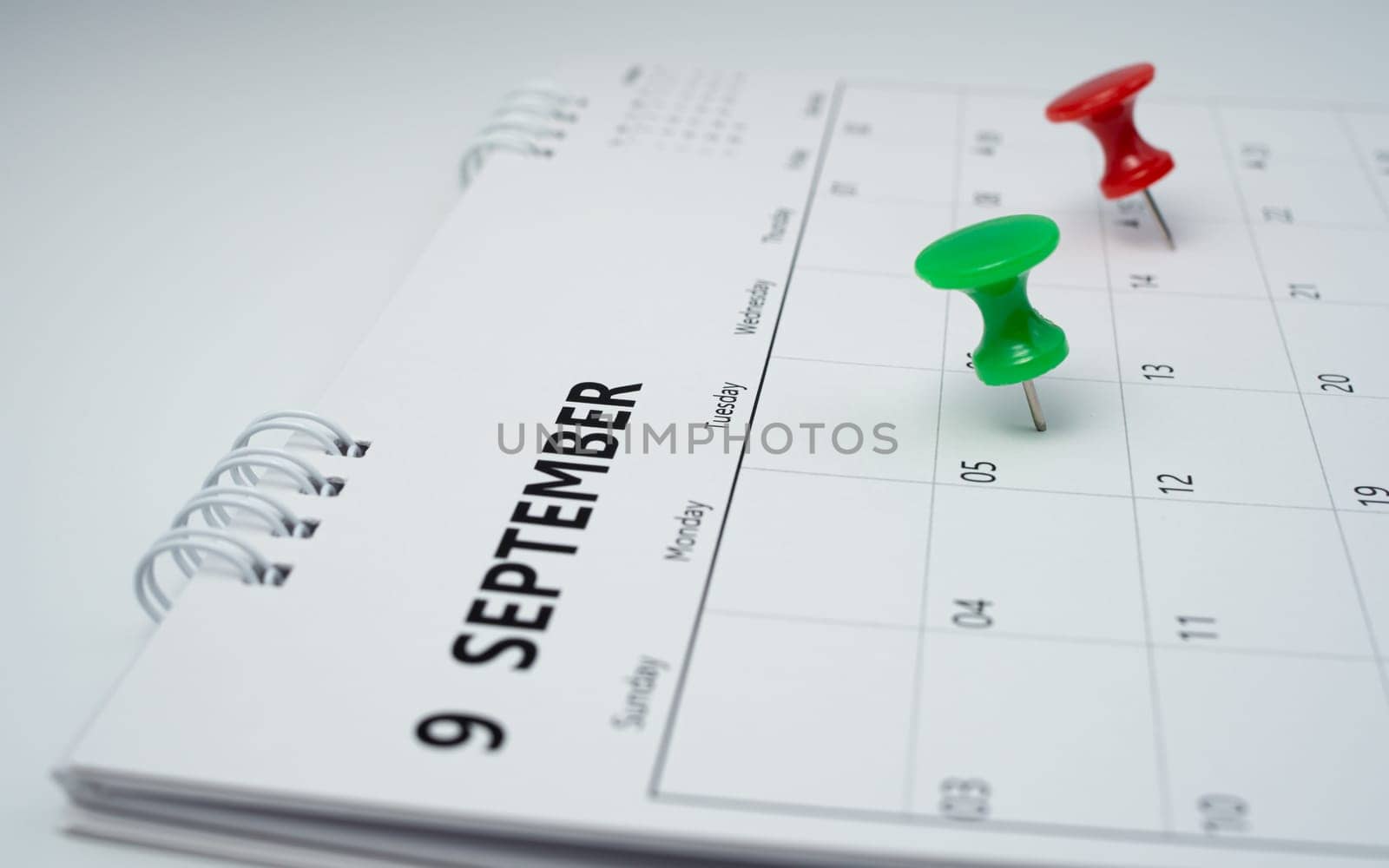 Pinning to the calendar It represents appointments, meeting reminders, planning for business meetings and travel planning concepts. by Unimages2527