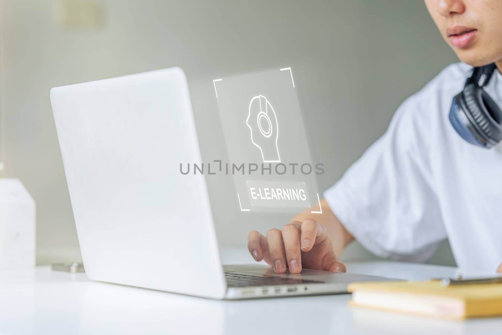 young man using laptop for learning course online, searching information.