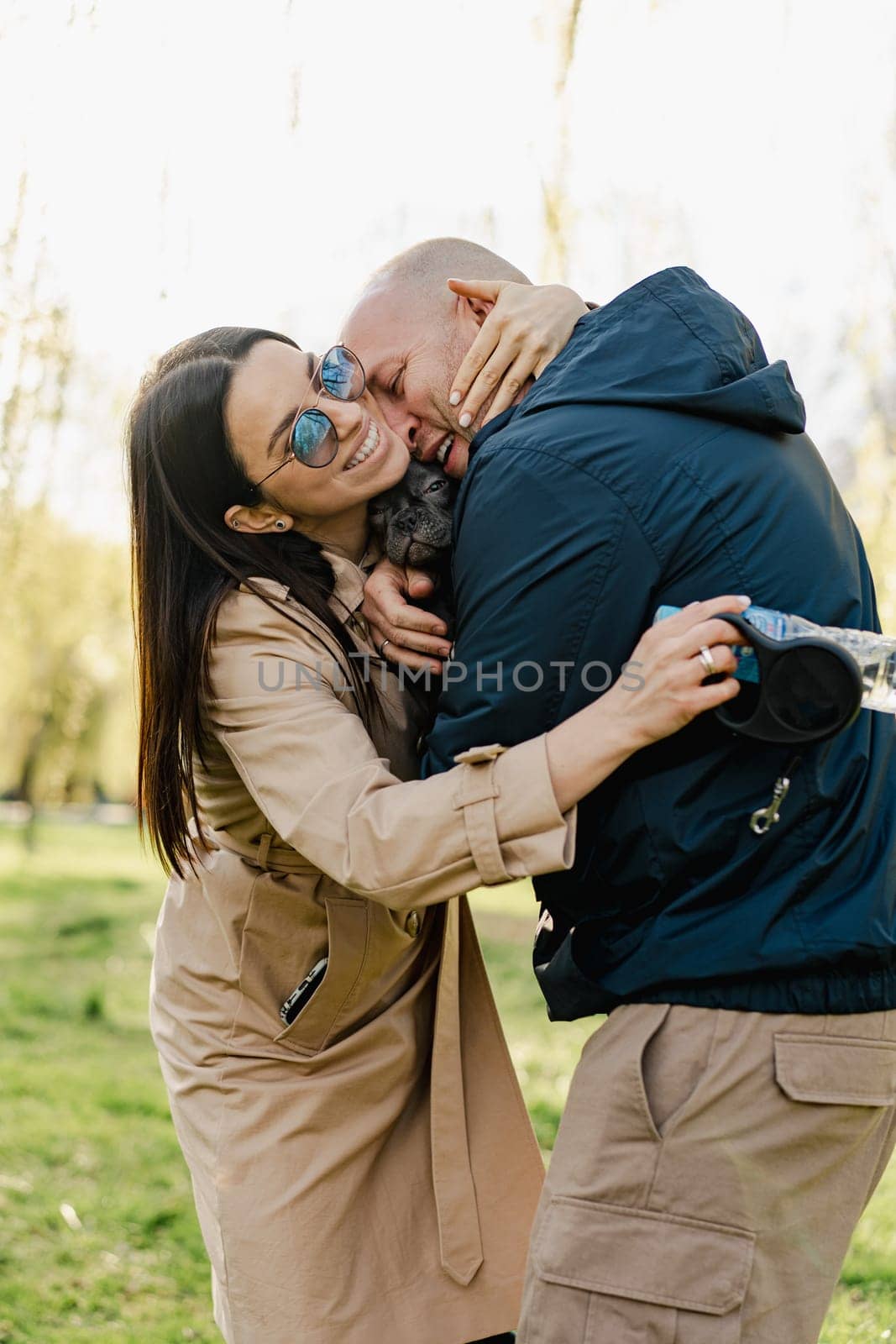 Happy couple on a walk in the park on autumn day close up photo