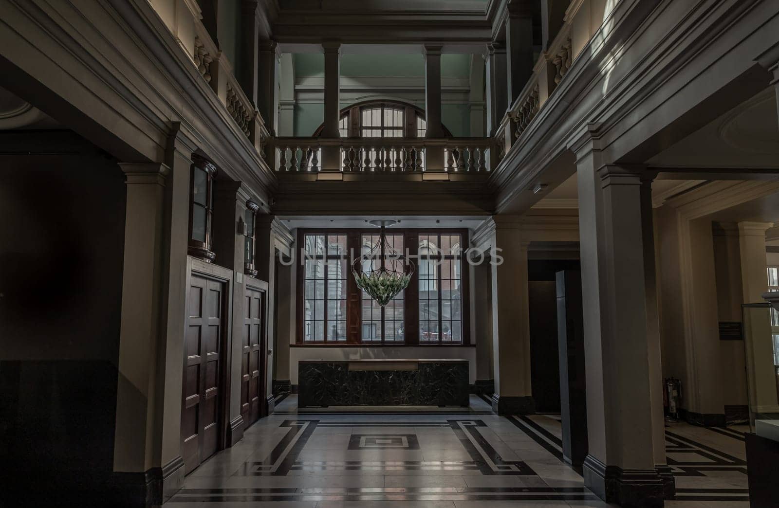 London, UK - Nov 01, 2023 - Beautiful interior architecture design. The room is Vintage dark tone to reveal the primacy of the central structure with ‘Exhale’ the world’s first living bionic chandelier which purifies the air indoors of Victoria and Albert Museum.